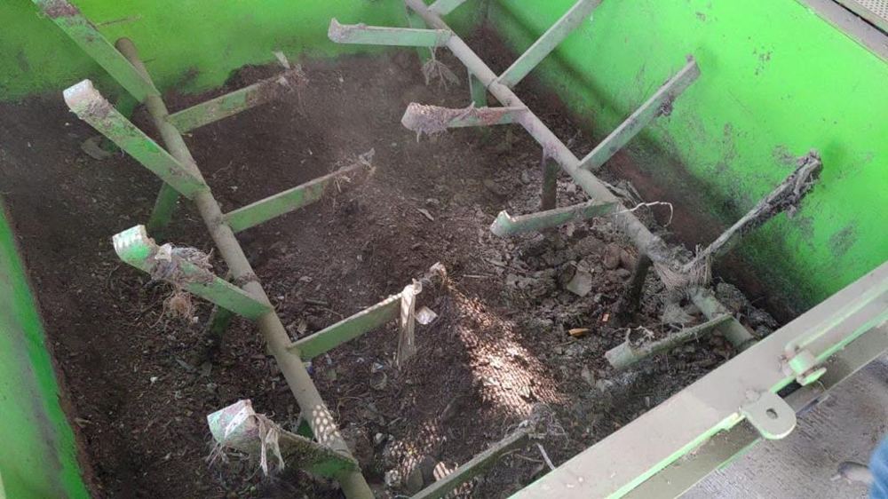 Compost material inside a processing unit